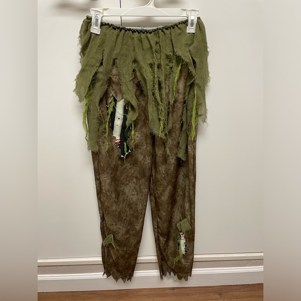 Walking Dead Costume Pants showing exposed broken/bloody femur bone